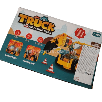 Іграшка Трактор Гідромолот із прозорим корпусом із підсвічуванням та звуком Truck Rotating Gear Жовтий