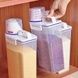 Контейнер для сыпучих продуктов с дозатором и мерным колпачком 2л Белый