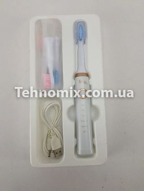 Електрична зубна щітка Shuke з 4-ма насадками Біла