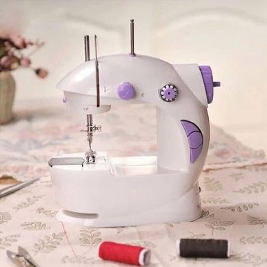 Швейная машинка портативная Mini Sewing Machine FHSM 201 с адаптером фиолетовая
