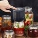 Машинка для закочування банок вакуумна акумуляторна Чорна