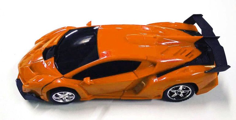 Машинка Трансформер Lamborghini Robot Car Size 18 ПОМАРАНЧЕВА З ПУЛЬТОМ